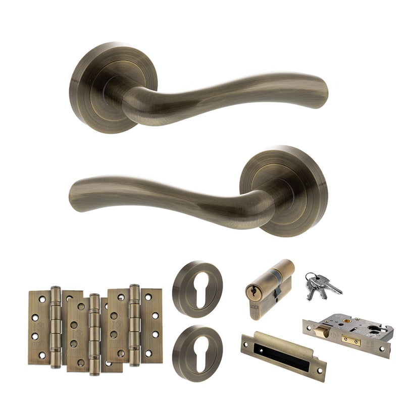 STATUS Texas Door Handle Pack (Euro Lock Set - 2.5" CE Sashlock, 4" Fire Rated Hinges x3) - Antique Brass